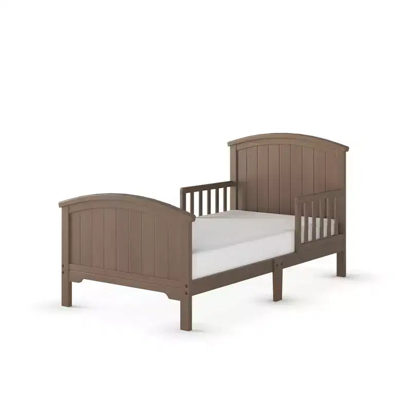 Lit pour tout-petit avec barreaux en arche, bas au sol, en pin
