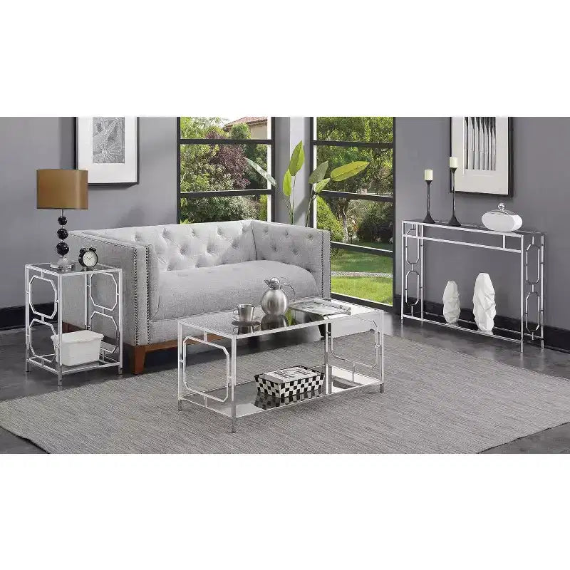 Table d'appoint chromée avec cadre élégant et surface lisse, table d'appoint contemporaine pour salon ou bureau