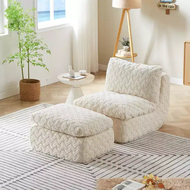 Fauteuil pivotant entièrement compressif avec pouf